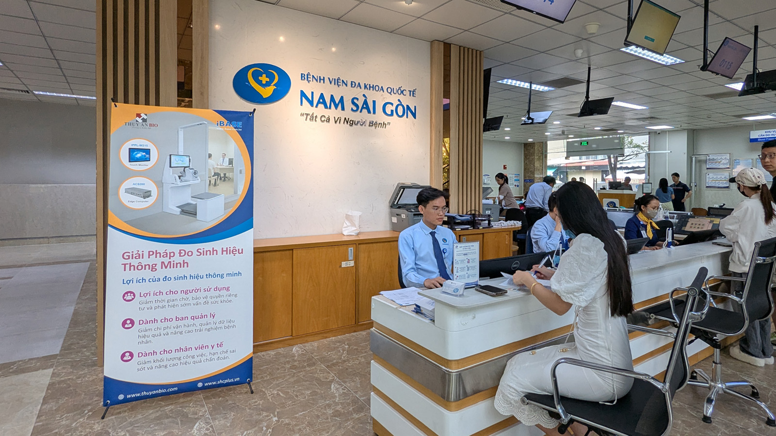 Smart vital sign station banner near the hospital entrance